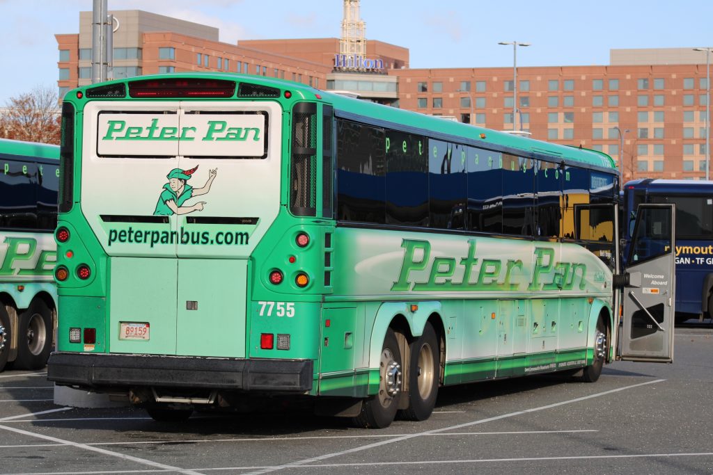 A bright green Peter Pan Bus.